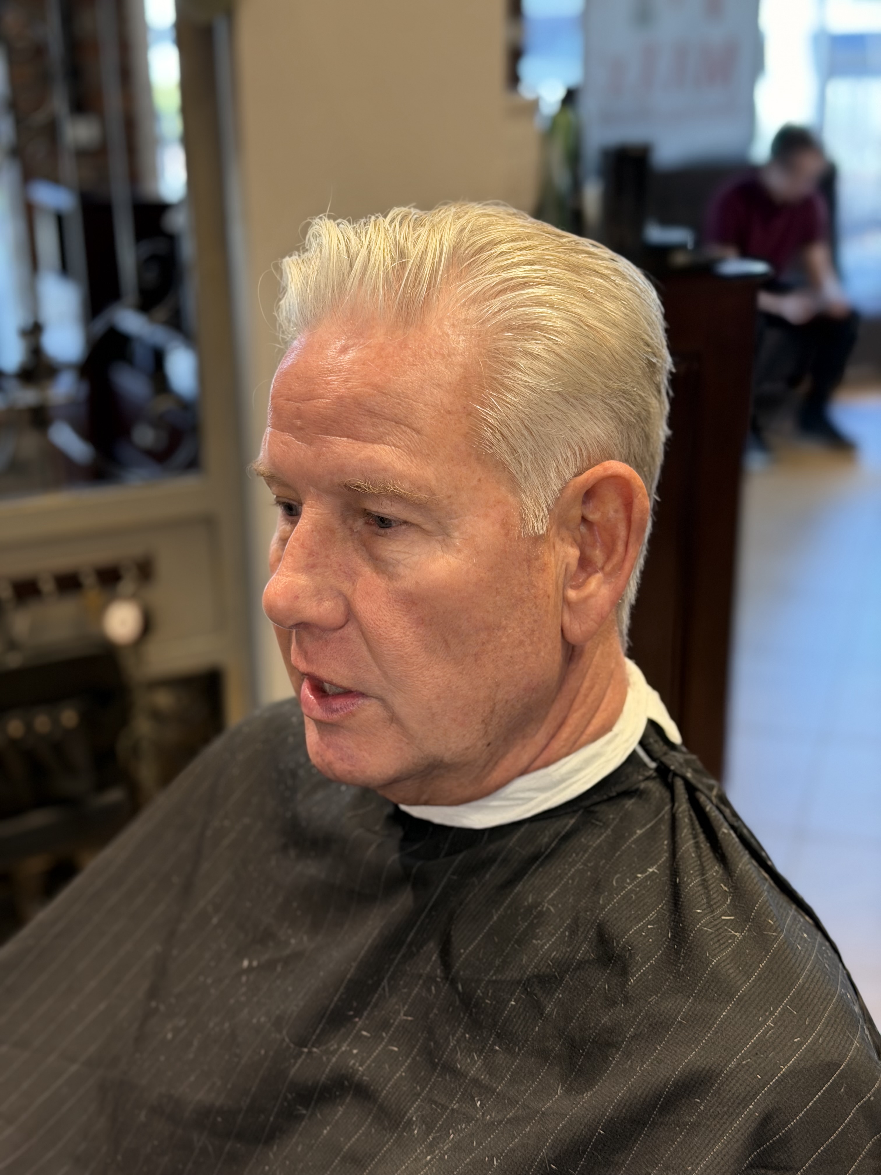 Classic gentleman's scissor cut finished at Maxx's Shaving Room in Stuart Florida